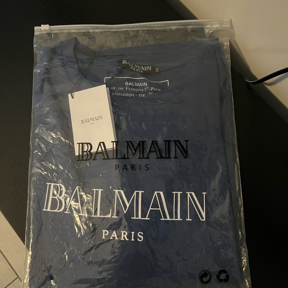 Men’s Balmain shirt, size L in US and a size 2xl in European sizing. brand new